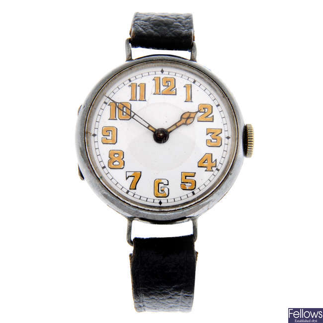 LOT:220 | WILSDORF & DAVIS - a silver trench wrist watch.