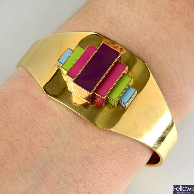 A fairtrade 18ct gold multicolour enamel 'Strata' cuff, by Hattie Rickards, commissioned by the World Gold Council for the Ultimate Fashion Show in Cannes 2013.