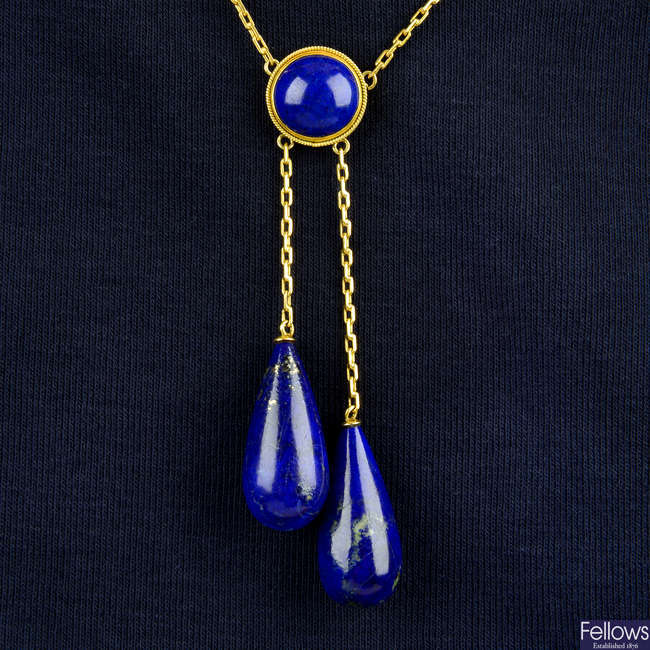 An early 20th century 18ct gold lapis lazuli negligee pendant necklace.