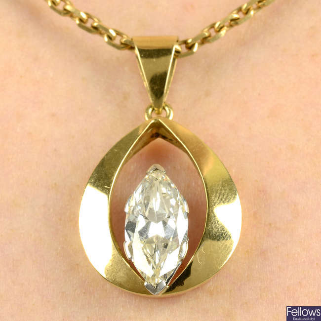 A marquise-shape diamond pendant, with chain.
