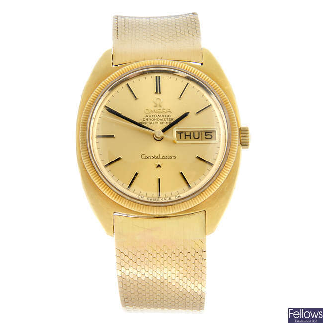 OMEGA - a yellow metal Constellation bracelet watch, 34mm.