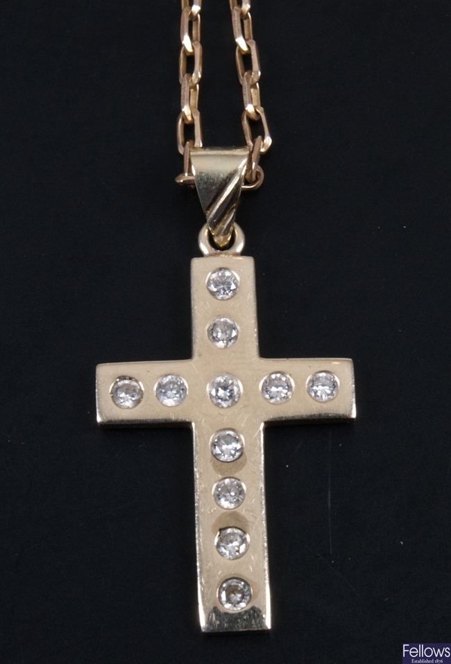 Diamond set cross pendant 3cm in length and set