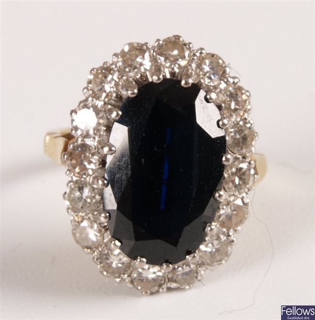 Large oval sapphire and diamond seventeen stone