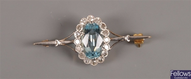 Edwardian bar brooch with an oval aquamarine and