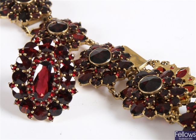 Three items of Bohemian garnet set jewellery