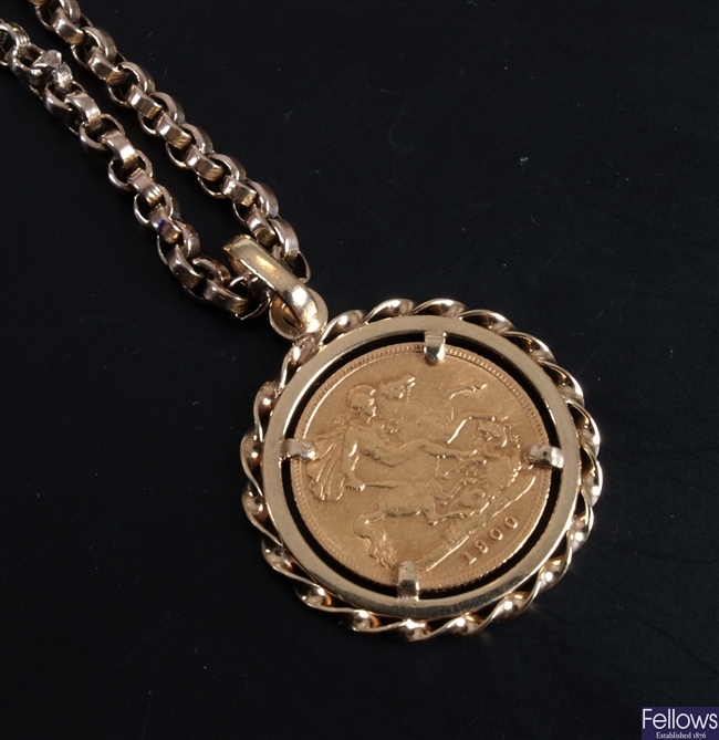 9ct gold mounted full sovereign pendant dated