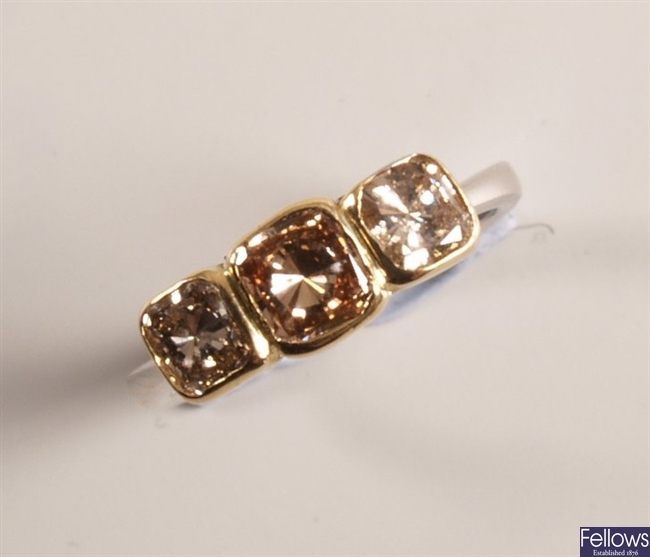18ct white gold mounted three stone diamond ring