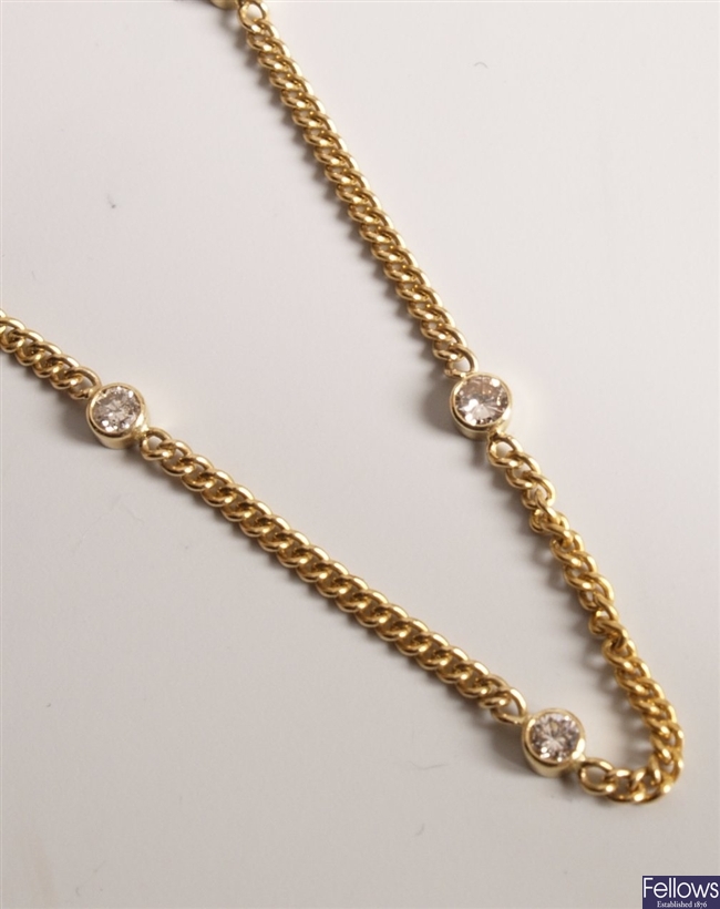 A 16 inch fine curb necklace with fourteen spaced
