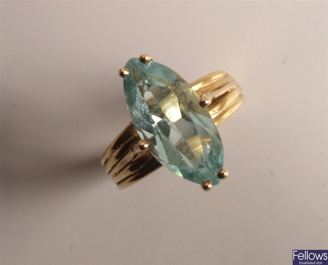 Single stone marquise shape aquamarine set ring.