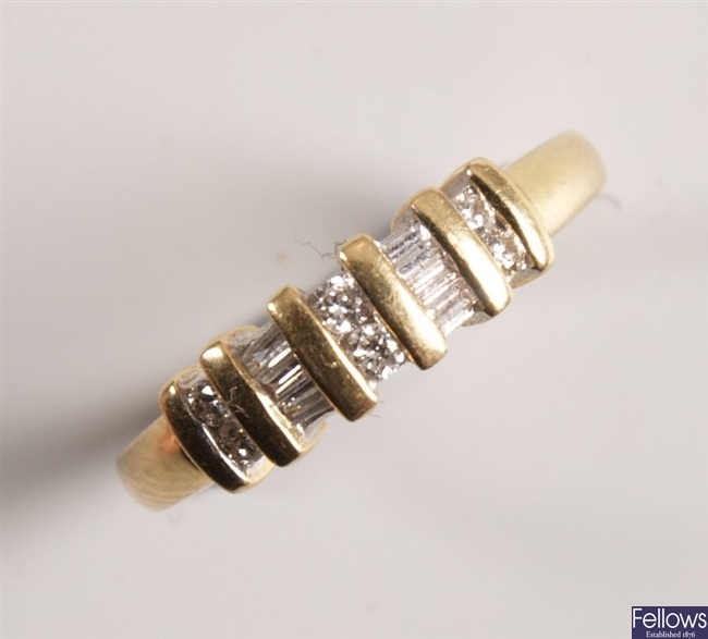 18k gold diamond set ring, with two central set
