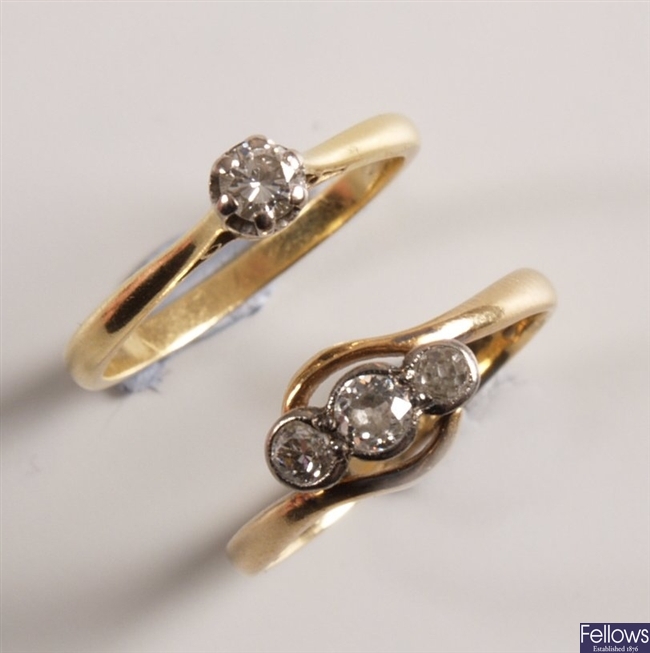 Two 18ct gold rings ro include a single stone