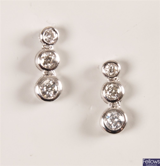 Pair of 18ct white gold diamond dropper earrings