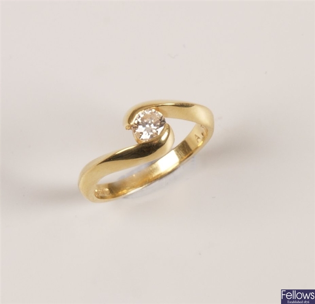 18ct gold single stone diamond crossover design