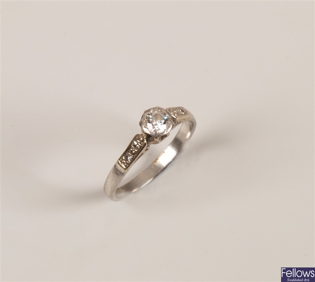 Platinum single stone diamond ring with an