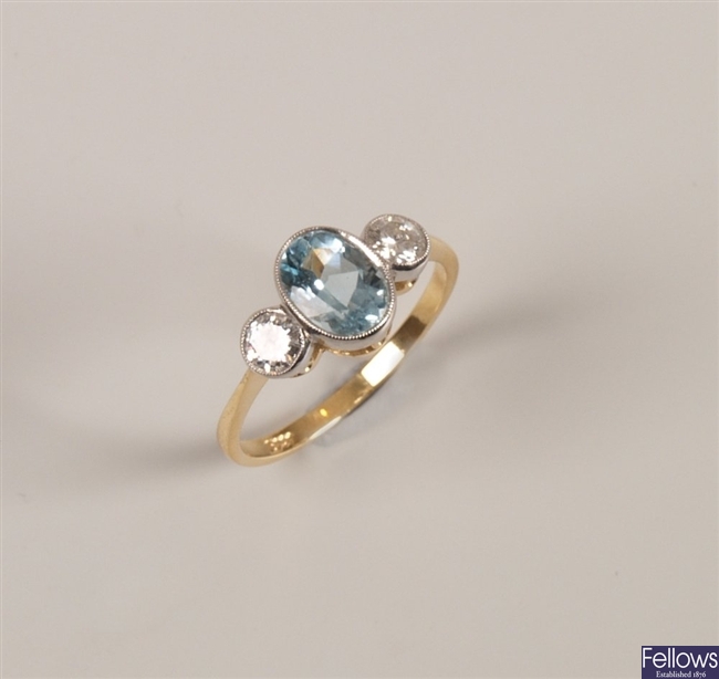 18ct gold three stone aquamarine and diamond ring