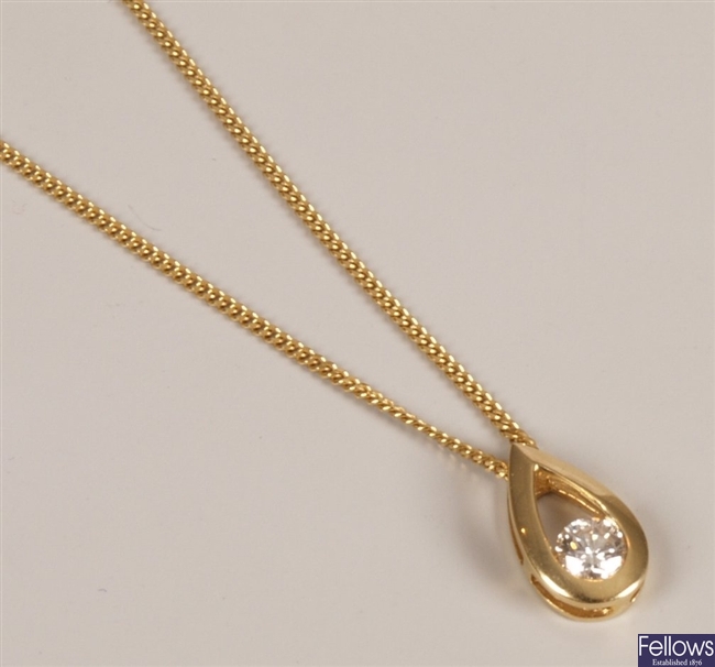 18ct gold tear drop shape pendant, set a single