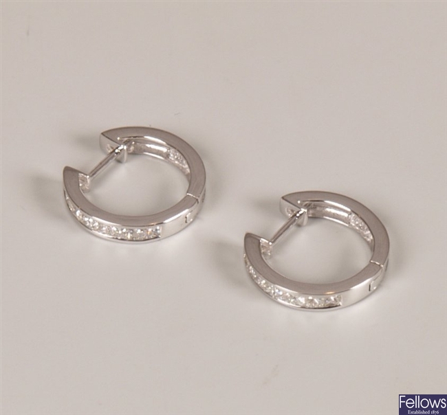 Pair of 18ct white gold diamond hoop earrings