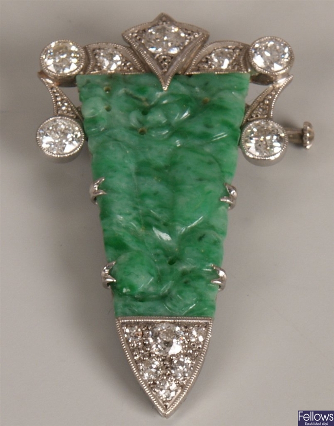 Diamond and jade set clip, with central carved