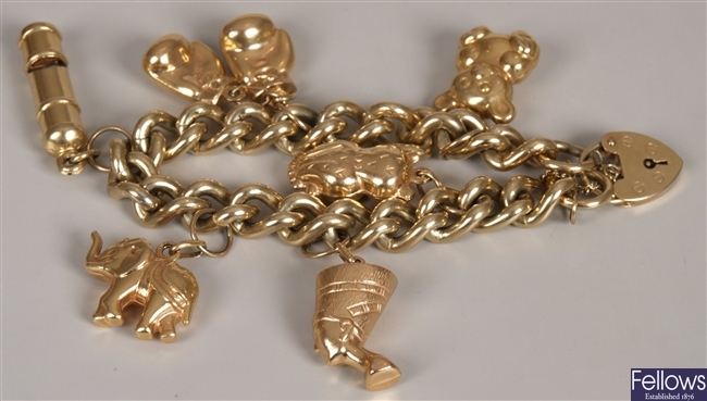 9ct yellow gold curb link bracelet and padlock
