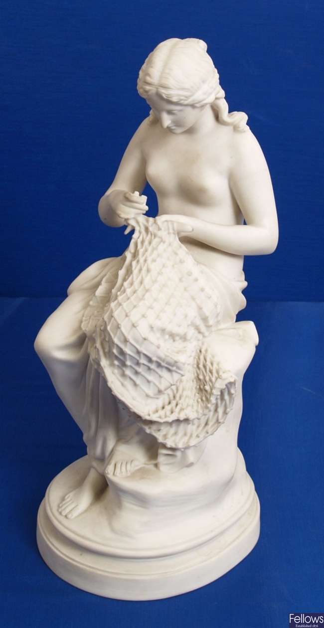 A Parian 19th century figure of a seated nude