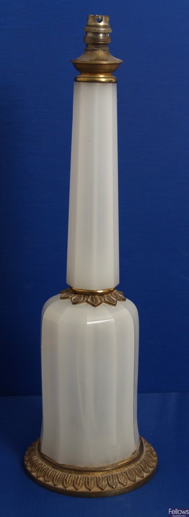 An opaque hexagonal column glass table lamp with