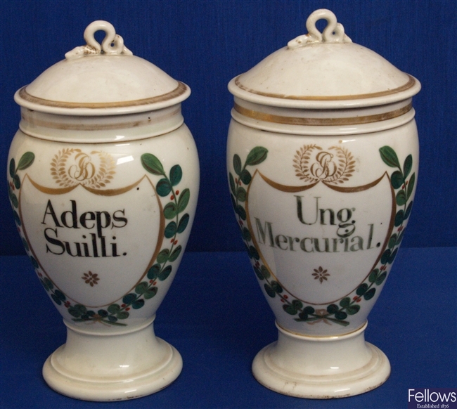 A pair of 19th century continental porcelain drug