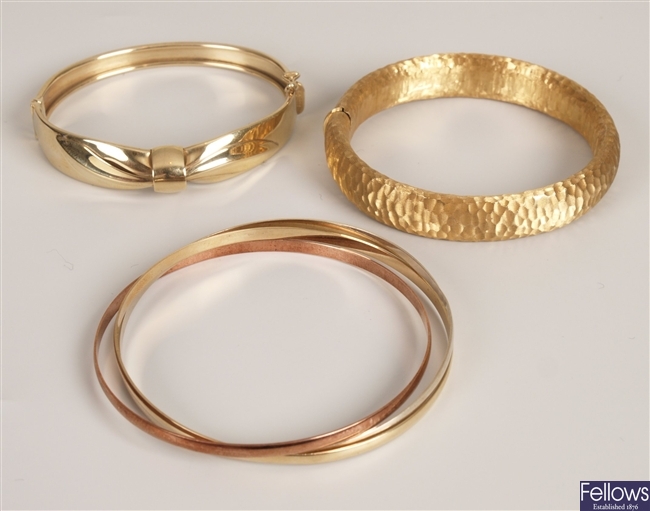 Three 9ct gold bangles, to include a 9ct gold