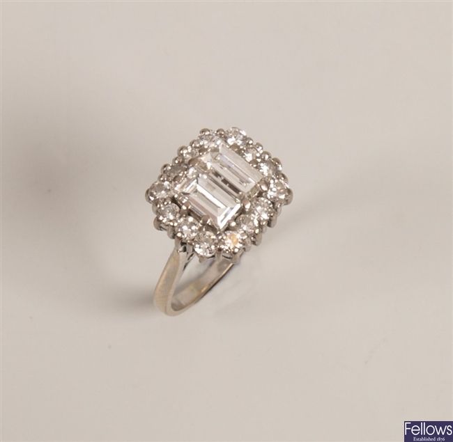 Diamond cluster ring with two central baguette