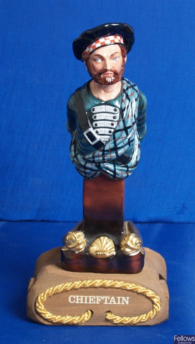 A Royal Doulton bone china figurine modeled as