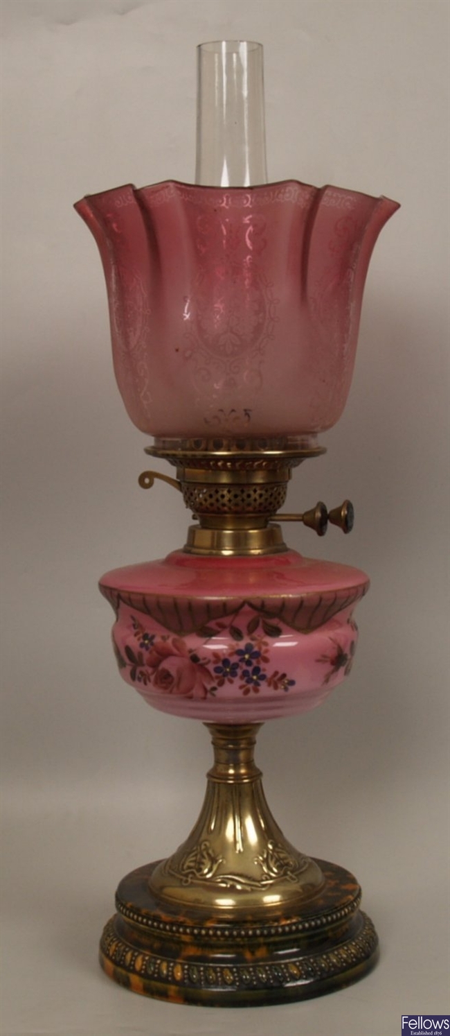 A Victorian table oil lamp, with pink etched