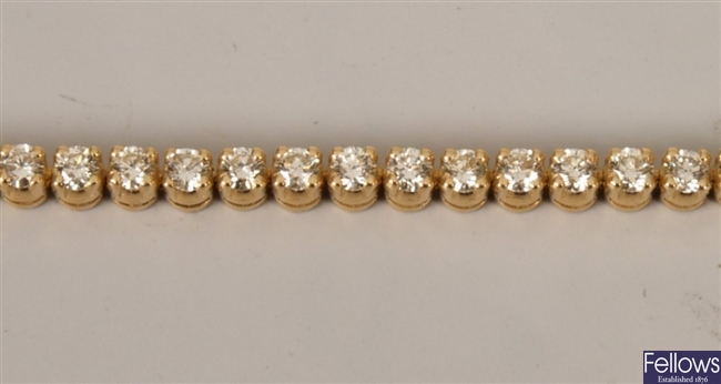 Diamond line bracelet with fifty two claw set