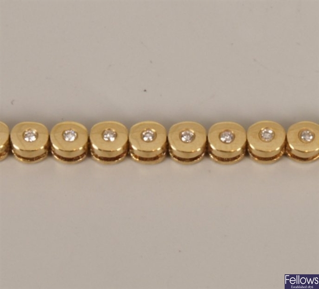 18ct gold diamond line bracelet with circular