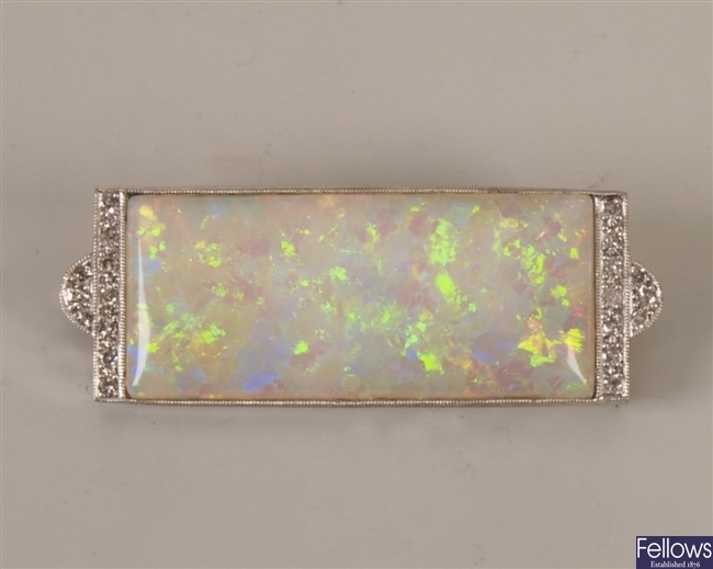 Opal and diamond brooch with a rectangular opal