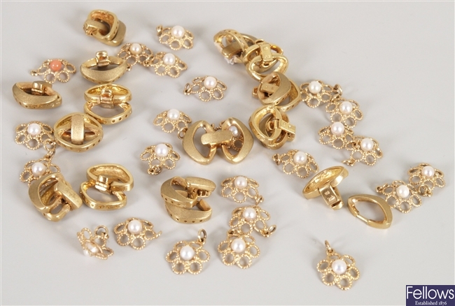 A quantity of 9ct gold pendents and necklace