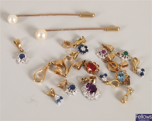 A quantity of 9ct gold gem set pendants, to