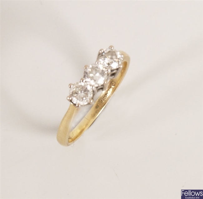 18ct gold claw set three stone diamond ring of