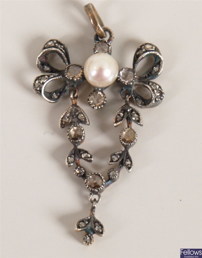 A cultured pearl and rose cut diamond pendent,