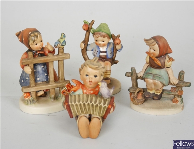 Four Goebel, M J Hummel figurines to include