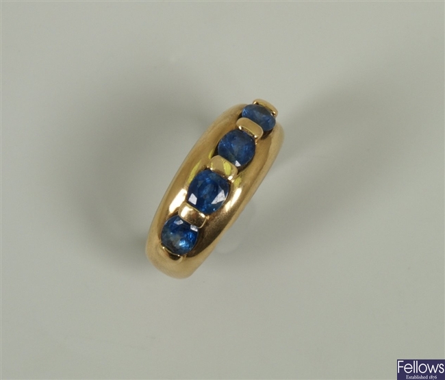 18ct gold four stone sapphire tapered band ring