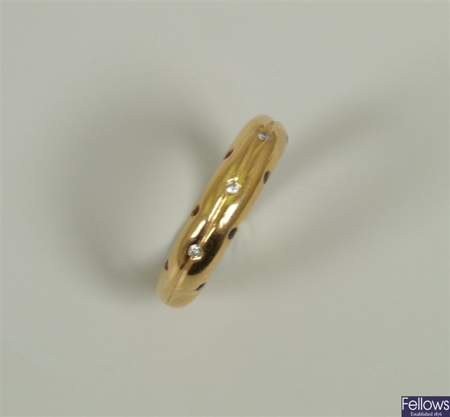 18ct gold band ring with three inlaid round