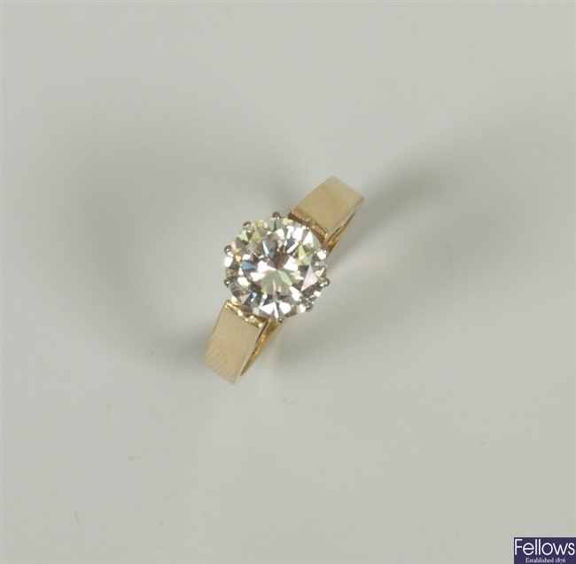 A single stone round brilliant diamond ring, in a