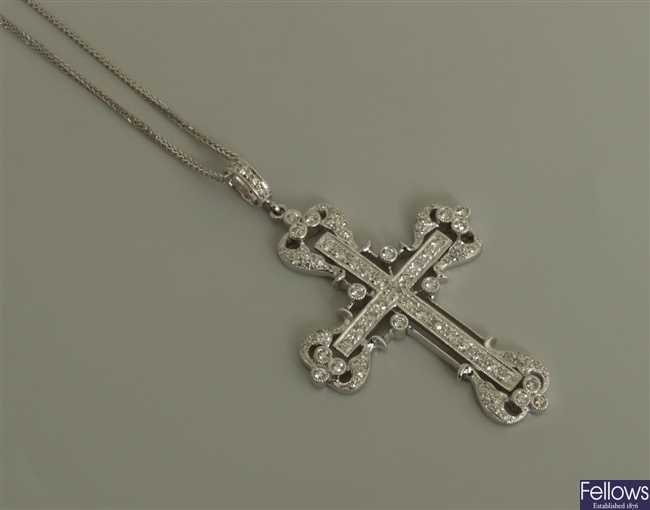 18ct white gold diamond cross pendant in an