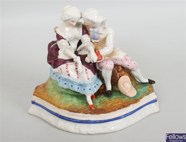 A 19th century porcelain desk stand modelled as a