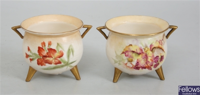 A pair of Nautilus porcelain miniature cauldrons,