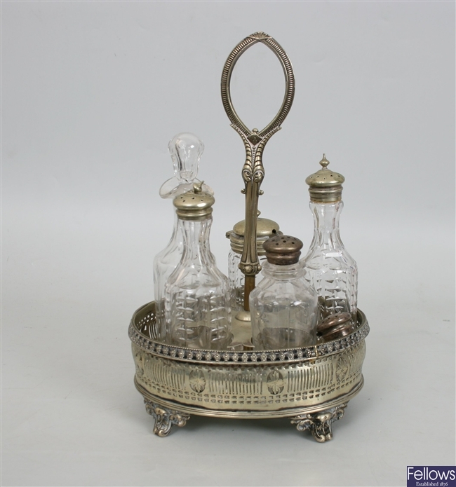 A 19th century silver plated five bottle cruet