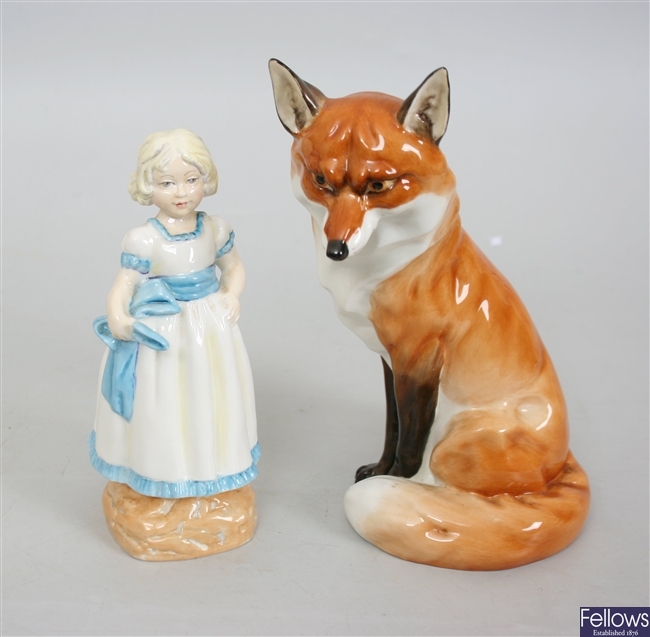 A Royal Worcester figurine of a young girl