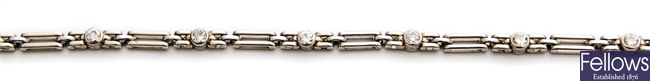 A French diamond set gate bracelet, comprising