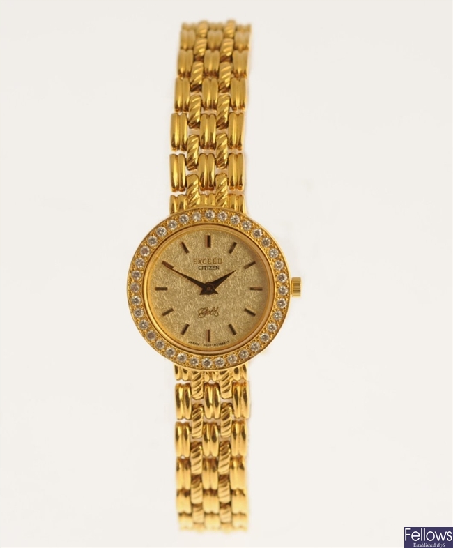 An 18k gold quartz lady's Exceed Citizen bracelet