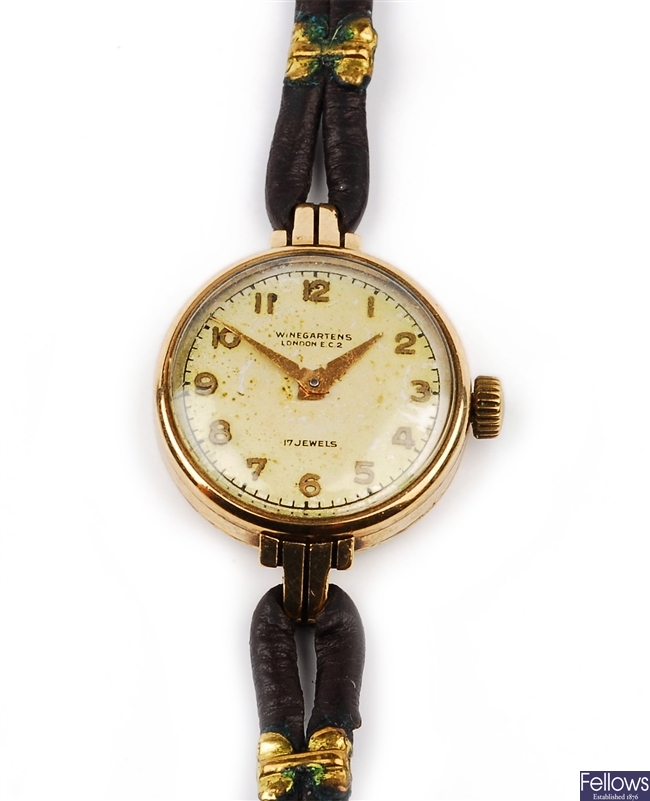 A manual wind 9ct gold wristwatch, signed