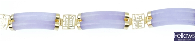 A lilac jade bracelet.